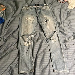 Paint splatter ripped boyfriend jeans